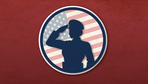 Woman veteran saluting.