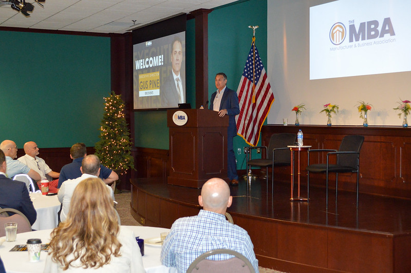 Photo of Gus Pine at the podium